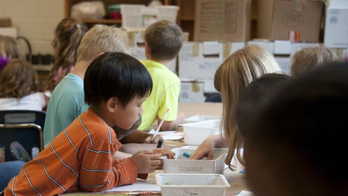 Photo showing children engaged in creative learning
